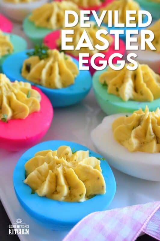 Easter isn't Easter without boiled eggs, so why not have some fun and make a batch of very Easter-y and very colourful Deviled Easter Eggs!? Don't hide these around the house and give the Easter Bunny all the credit! #deviledeggs #eastereggs #easter #deviled #boiledeggs #dyedeggs