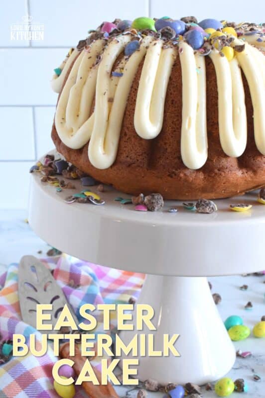 If it's a super moist and fluffy cake recipe you're looking for, look no further!  This Easter Buttermilk Cake is absolutely delicious just as it is, but the cream cheese frosting, which is prepared with buttermilk as well, makes this cake taste extraordinary!  Loaded up with chocolate eggs, this cake is sure to delight and impress! #bundtbakers #easter #buttermilk #cake #bundt