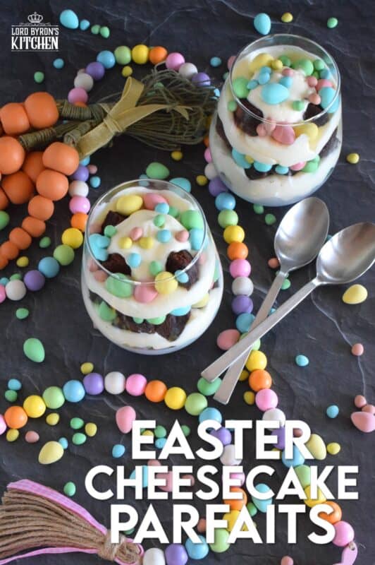 Crumbled brownies are layered with chocolate mini eggs and a homemade cream cheese filling in this Easter Cheesecake Parfait recipe. Easily prepare everything a few days ahead of time and assemble the parfaits when ready to serve. Make extra because these are deliciously addictive! #easter #dessert #parfait #brownie #minieggs