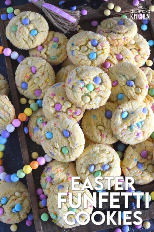 Candy-coated chocolate and pastel sprinkles are very popular when baking for Easter, especially if you're baking for kids!  However, the kids are going to have to share with the adults, because when it comes to these Easter Funfetti Cookies, they appeal to everyone! With a sweet, sugary coating, these soft and chewy cookies are loaded with lots of colour and flavour!  It's hard to eat just one of these! #easter #funfetti #candy #sprinkles #pastel #cookies