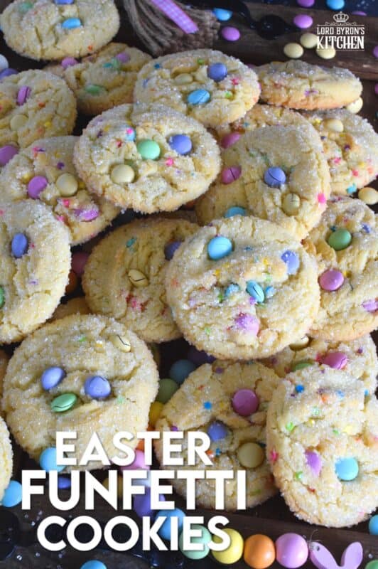 Candy-coated chocolate and pastel sprinkles are very popular when baking for Easter, especially if you're baking for kids!  However, the kids are going to have to share with the adults, because when it comes to these Easter Funfetti Cookies, they appeal to everyone! With a sweet, sugary coating, these soft and chewy cookies are loaded with lots of colour and flavour!  It's hard to eat just one of these! #easter #funfetti #candy #sprinkles #pastel #cookies