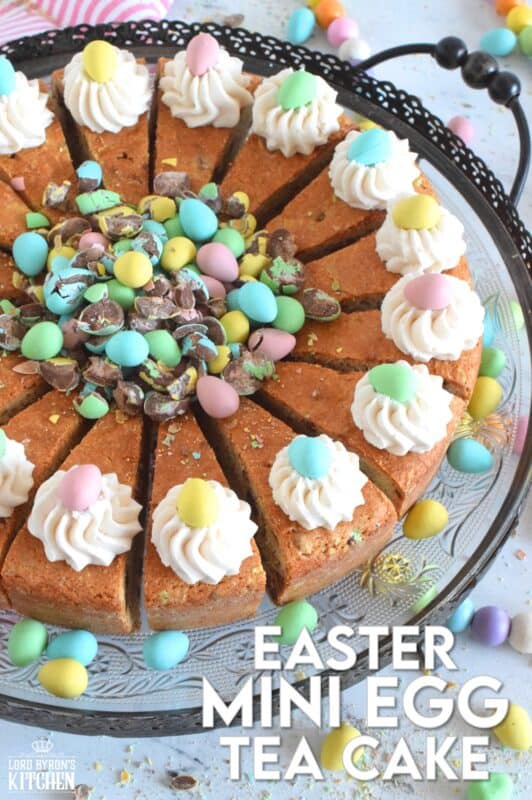 Prepared with crushed chocolate mini eggs and topped with a dollop of buttercream frosting, this Easter Mini Egg Tea Cake looks quite delicious and inviting! Keep the decorating simple with a pile of mini eggs right in the center and let the cake speak for itself! A delightful treat, this cake is a beautiful Easter dessert! #minieggs #easter #cadbury #cake #teacake