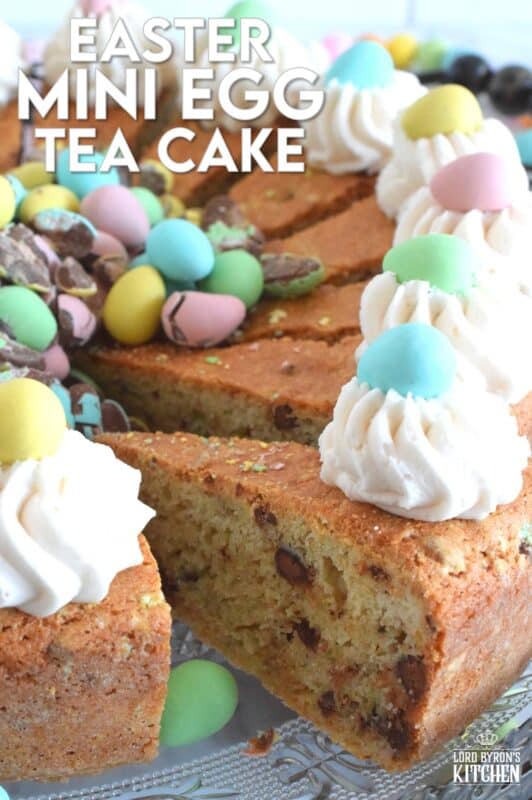 Prepared with crushed chocolate mini eggs and topped with a dollop of buttercream frosting, this Easter Mini Egg Tea Cake looks quite delicious and inviting! Keep the decorating simple with a pile of mini eggs right in the center and let the cake speak for itself! A delightful treat, this cake is a beautiful Easter dessert! #minieggs #easter #cadbury #cake #teacake