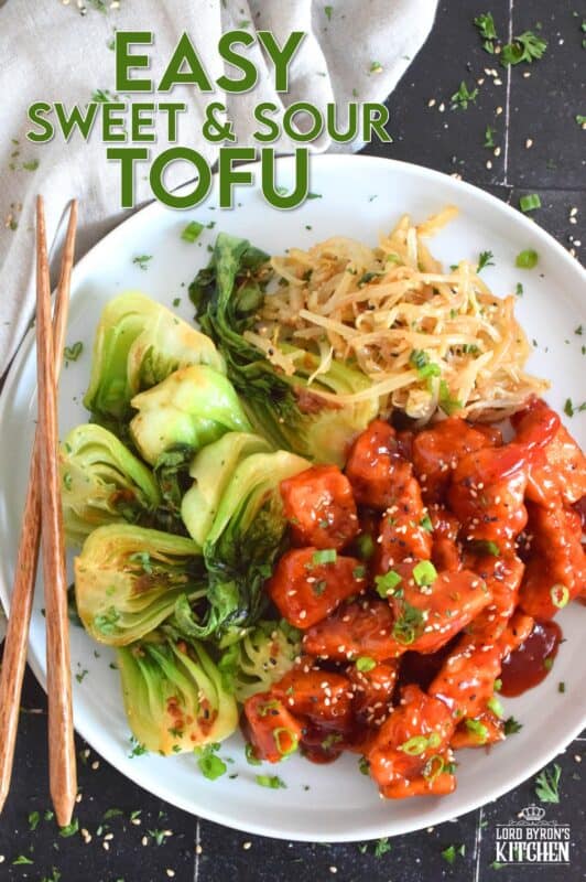 Extra firm tofu is seasoned and baked until lightly crispy on the outside with a slightly chewy, meatier inside. It is then tossed in a homemade sweet and sour sauce which makes this one of the most delicious ways to enjoy a baked tofu dish! If you think you don't like tofu, you obviously have not tried this recipe! #tofu #sweetandsour #meatless
