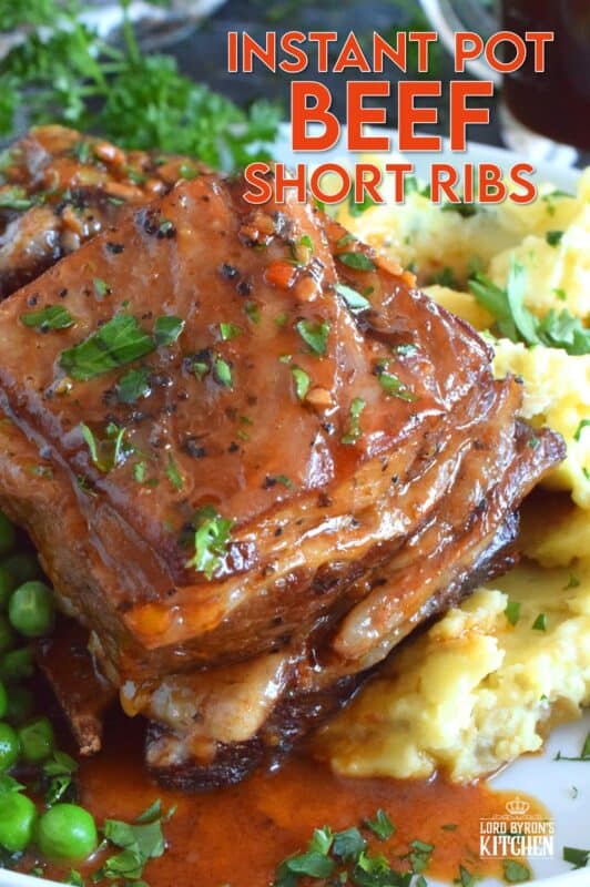Saucy and savoury, Instant Pot Beef Short Ribs are tender and flavourful - just the way ribs should be!  Take the long, slow-braising, stovetop cooking method out of the equation with this faster instant pot recipe! The braising liquid easily doubles as a delicious gravy too! #instantpot #ribs #shortribs #beef #beefribs