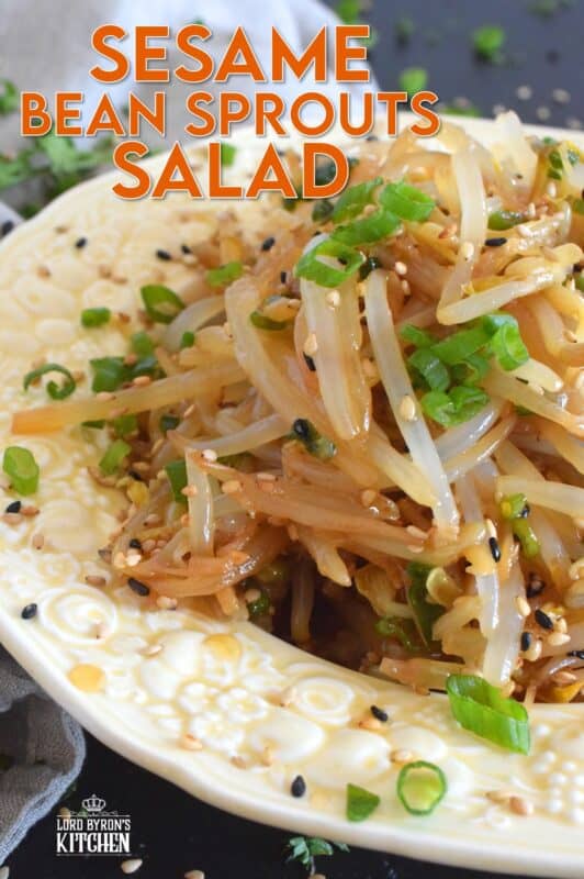 Served warm or cold, Sesame Bean Sprouts Salad is a crunchy and delicious side that can be prepared in less than 10 minutes! Blanched sprouts are tossed in a savoury, earthy, salty sauce made with soy sauce, sesame oil, minced garlic, and lots of fresh green onions. #beansprouts #salad #sesame