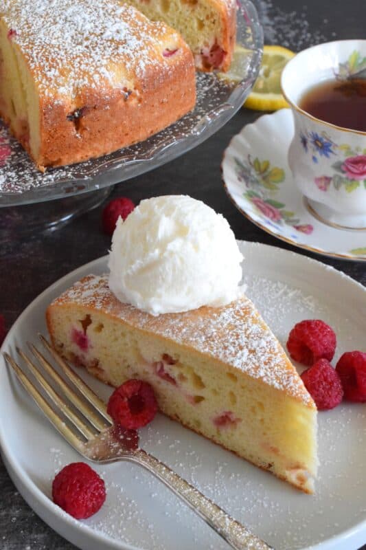Old fashioned is new again with this Rhubarb Sour Cream Cake; made with simple pantry ingredients, and served only with a dusting of powdered sugar and a scoop of good vanilla ice cream, this cake is the epitome of all early summer desserts! #rhubarb #cake #desserts