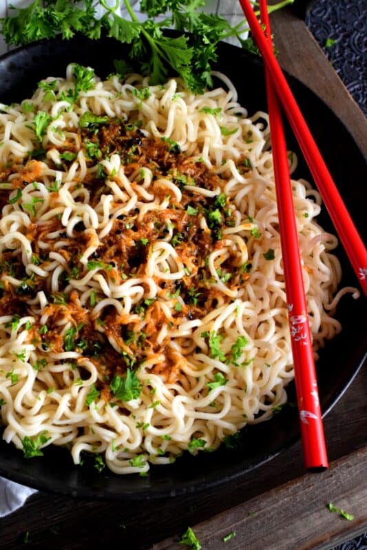 A complete dinner, from start to finish, in less than 15 minutes - yes, it's possible! Garlic Ginger Sesame Soy Noodle Sauce is all the proof you need! Replace those powder packets in your instant ramen with this easy sauce for a much tastier noodle experience! #ramen #noodles #ginger #garlic #sauce