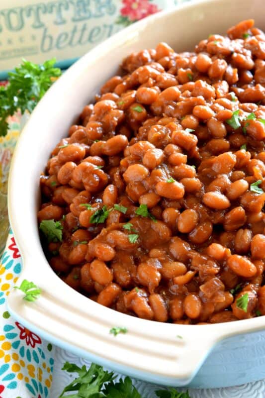 Baked Beans do not need bacon! They don't need to be baked either Stovetop Vegetarian Baked Beans are fast, cheap, and easy - and nobody will notice the missing pork product! If you're grilling tonight, serve these beans and some corn as a side! #vegetarian #bakedbeans #stovetop #summersides #cannedbeans #molasses