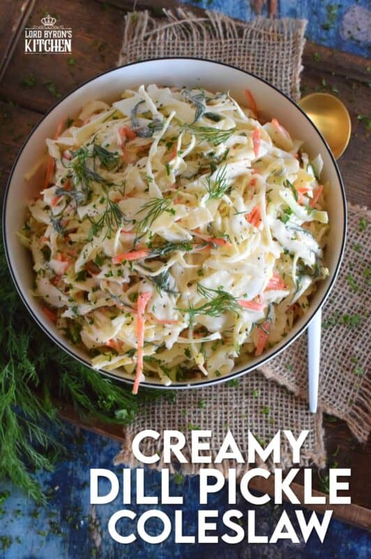 If you love dill, this Creamy Dill Pickle Coleslaw is for you! Slightly sweet and tangy, it is packed with lots of dill pickle flavour. In this recipe, there are three layers of dill flavour. There's lots of fresh dill, dill pickle juice, and finely chopped dill pickles. Is your mouth watering yet? #dillpickle #coleslaw #creamycoleslaw #pickles #salad