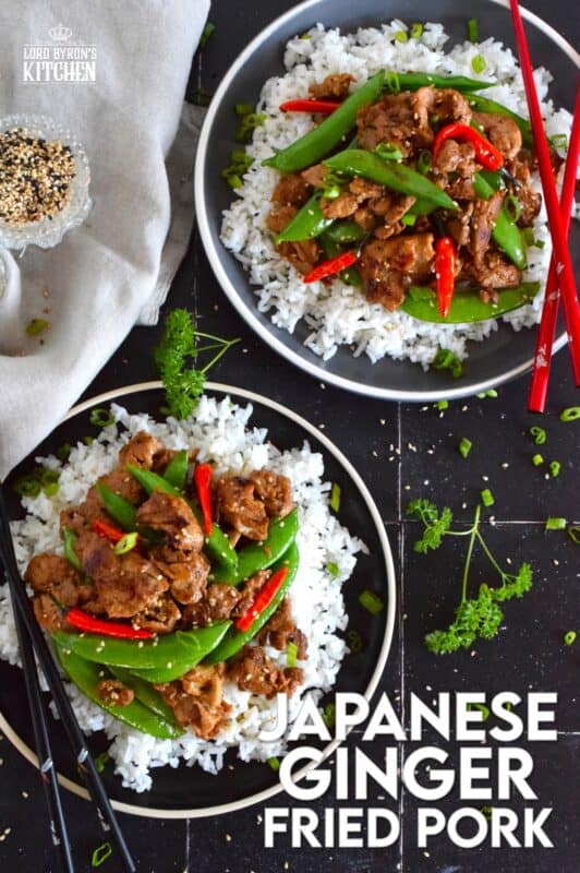 Marinate the pork ahead of time and prepare dinner in about ten minutes flat with this Japanese Ginger Fried Pork recipe.  Made with red bell peppers and snow peas, serve over steamed rice for a completely nutritious meal! #pork #japanese #asianfood #stirfry #ginger