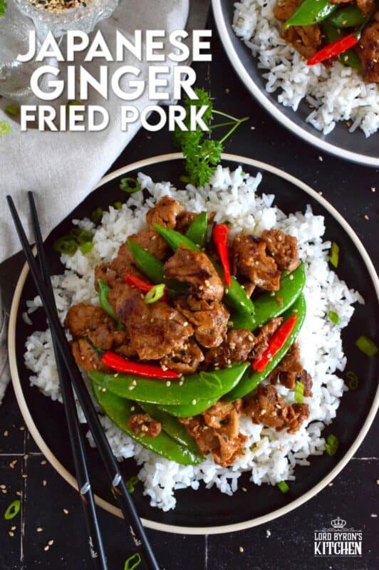 Marinate the pork ahead of time and prepare dinner in about ten minutes flat with this Japanese Ginger Fried Pork recipe.  Made with red bell peppers and snow peas, serve over steamed rice for a completely nutritious meal! #pork #japanese #asianfood #stirfry #ginger