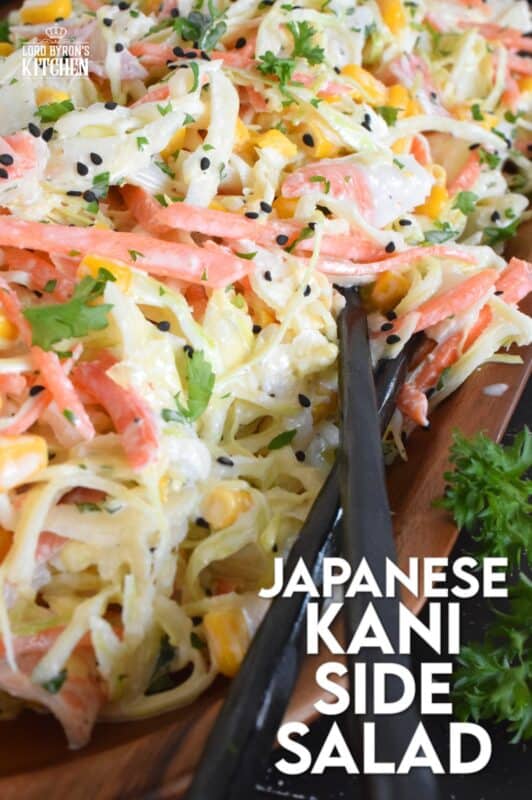 A popular side dish served with sushi, a Japanese Kani Side Salad is so delightfully refreshing, it should not be limited to just a sushi side! Prepared with imitation crab, shredded cabbage, julienned carrots and corn in a creamy and zesty sauce, this salad is wonderfully easy and exceptionally delicious! #kani #salad #japanese #crab