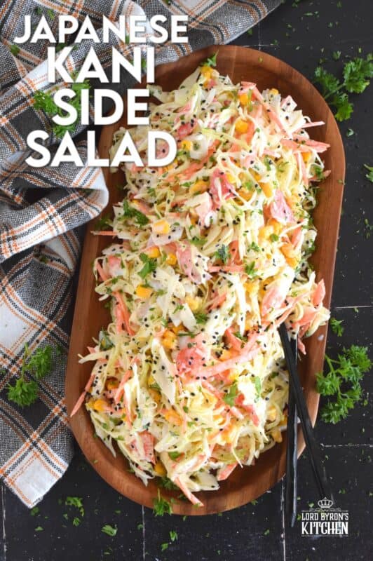 A popular side dish served with sushi, a Japanese Kani Side Salad is so delightfully refreshing, it should not be limited to just a sushi side! Prepared with imitation crab, shredded cabbage, julienned carrots and corn in a creamy and zesty sauce, this salad is wonderfully easy and exceptionally delicious! #kani #salad #japanese #crab