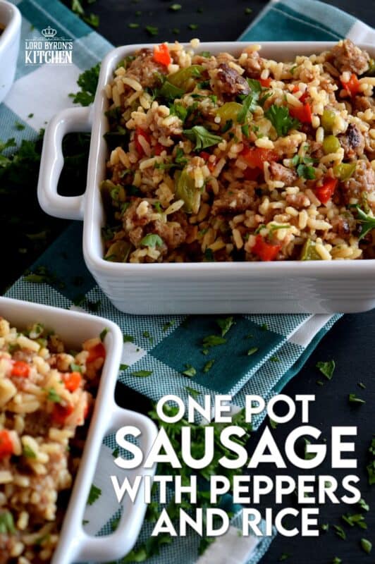 Weeknight dinners can't get any easier than this! Grains, protein, and veggies all together in this One Pot Sausage with Peppers and Rice. This dish has all the bases covered and with very little cleanup as well! Make extra because not only does it freeze well, it reheats quickly and easily too! #onepot #sausage #peppers #rice #familydinners