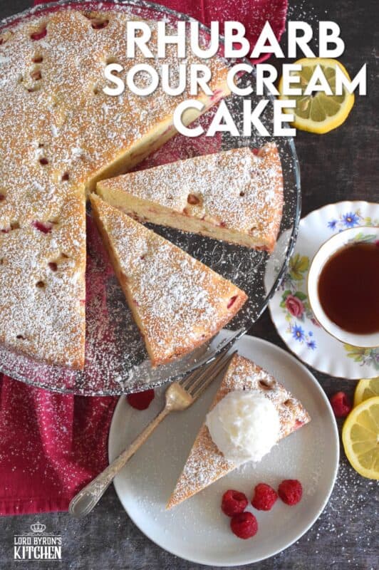 Old fashioned is new again with this Rhubarb Sour Cream Cake; made with simple pantry ingredients, and served only with a dusting of powdered sugar and a scoop of good vanilla ice cream, this cake is the epitome of all early summer desserts! #rhubarb #cake #desserts