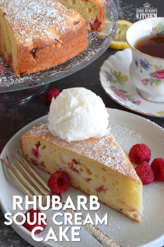 Old fashioned is new again with this Rhubarb Sour Cream Cake; made with simple pantry ingredients, and served only with a dusting of powdered sugar and a scoop of good vanilla ice cream, this cake is the epitome of all early summer desserts! #rhubarb #cake #desserts