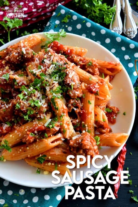 Prepare your next pasta dish with pork, like this Spicy Sausage Pasta dish, and reinvent pasta night! A spicy tomato sauce, with peppers and onions, and lots of dried chillies, is simple and rustic, but so delicious! This hearty meal is make-ahead and freezer friendly too! #penne #pasta #italian #sausage #spicy