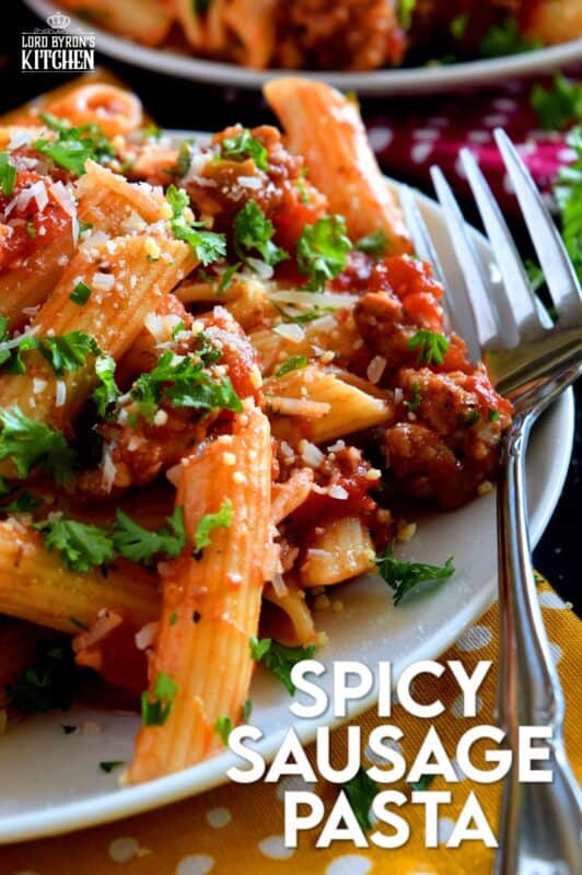 Prepare your next pasta dish with pork, like this Spicy Sausage Pasta dish, and reinvent pasta night! A spicy tomato sauce, with peppers and onions, and lots of dried chillies, is simple and rustic, but so delicious! This hearty meal is make-ahead and freezer friendly too! #penne #pasta #italian #sausage #spicy