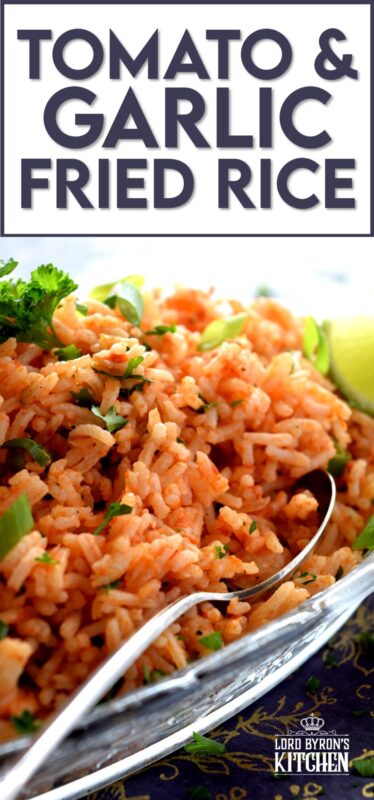 A fast and delicious side dish using leftover rice! Tomato and Garlic Fried Rice is prepared with a hint of fresh lime, and the rustic flavours of onions, garlic, and tomatoes, this dish is sure to bring much needed life to any plate! #friedrice #rice #garlicky #leftover #sidedish