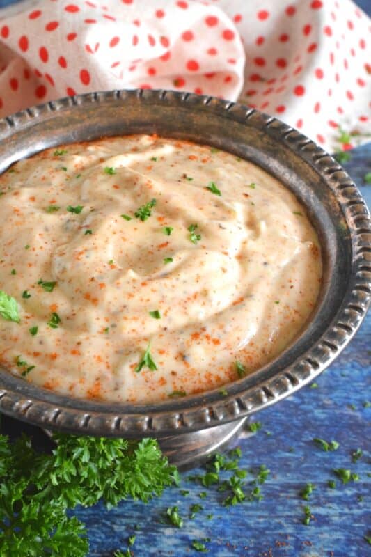 When it comes to seafood, one of the best all-purpose seasonings is Old Bay Seasoning, and it can be found in almost every grocer. Just look for the bright, yellow, rectangular can in the spice section. This tartar sauce recipe is an update on everyone's favourite fried fish condiment! #tartarsauce #seafoodsauce #fishsauce #oldbay #oldbayseasoning