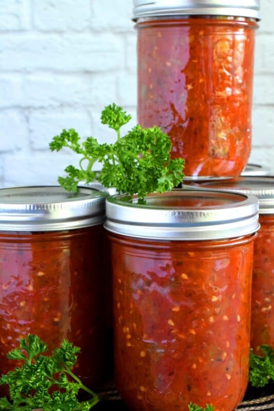 A great base to any pasta sauce, soup or stew; Canned Stewed Tomatoes is an inventive way to jazz up baked chicken or broiled seafood. Each jar is packed with tomatoes, onions, celery, and green bell pepper, making meal prep fast and easy! #canned #preserved #tomatoes #stewed