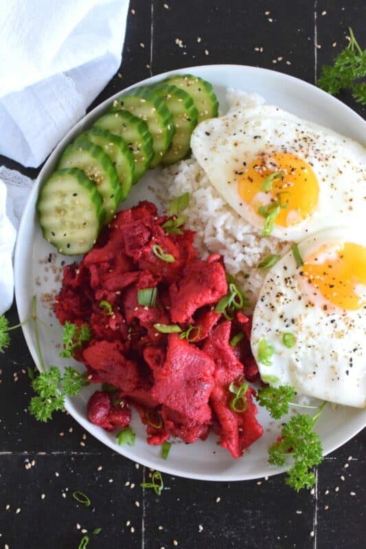 One of the easiest and most delicious pork recipes is this Filipino-Style Pork Tocino. Thinly sliced pork is marinated in sugar and seasonings and then pan-fried until tender and fully caramelized. Traditionally served with rice and fried eggs, this recipe is definitely a keeper! #filipino #pork #tocino