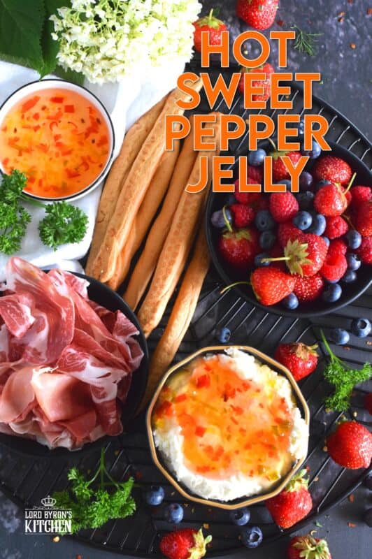 Possibly considered to be more of an appetizer or a dip, Hot Sweet Pepper Jelly is easy to prepare and makes for a quick and easy appetizer or ingredient. These are canned using the water bath canning method, which couldn't be easier! This post will walk you through every step. #hotpepperjelly #hotandsweet #sweetpeppers #canning #preserves #jelly #cannedjelly