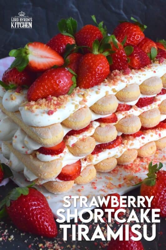 Locally grown strawberries are about to be in season which means it is time for a little indulgence! Strawberry Shortcake Tiramisu is the most delicious summertime dessert. With layers of homemade strawberry shortcake crumbs, light and airy ladyfingers, and a thick, slightly sweet filling, this dessert is completely irresistible! #strawberry #shortcake #tiramisu