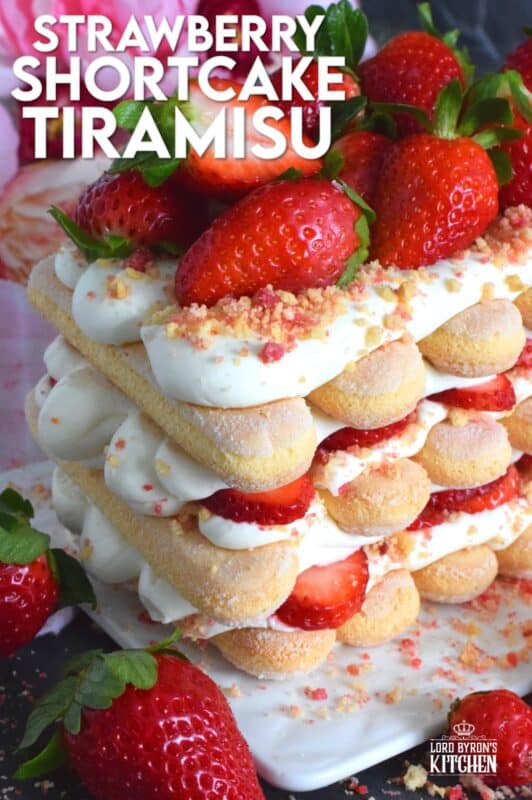 Locally grown strawberries are about to be in season which means it is time for a little indulgence! Strawberry Shortcake Tiramisu is the most delicious summertime dessert. With layers of homemade strawberry shortcake crumbs, light and airy ladyfingers, and a thick, slightly sweet filling, this dessert is completely irresistible! #strawberry #shortcake #tiramisu