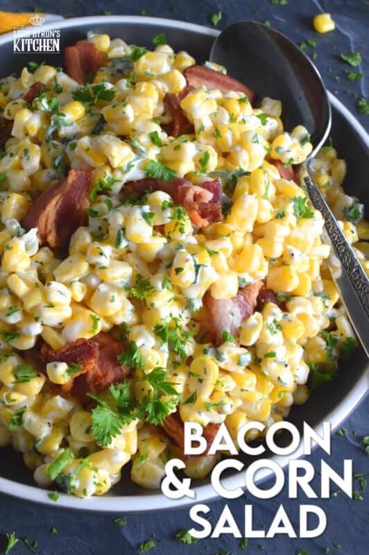 Serve this Bacon and Corn Salad warm as a side to your favourite summer grilled mains. Loaded with fried bacon, bright yellow corn, and fresh green onions, this salad is tossed with a kicked-up mayonnaise-based dressing. Can be prepared ahead of time too and just lightly reheated through just before serving! #bacon #corn #salad