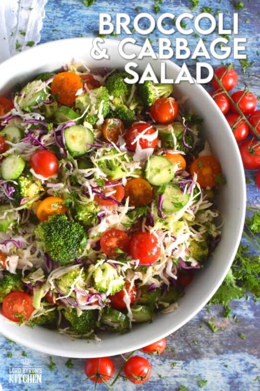 This salad is as fresh and as crisp as a salad can be! Loaded with both red and green cabbage, broccoli florets, tomatoes, and cucumbers, and tossed with an oil and vinegar dressing, this salad is light, healthy, and colourful. Perfect as a summer side, great for picnics, and can be made ahead of time too! #cabbage #salad #broccoli #side #summer #vinaigrette