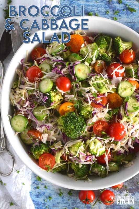 This salad is as fresh and as crisp as a salad can be! Loaded with both red and green cabbage, broccoli florets, tomatoes, and cucumbers, and tossed with an oil and vinegar dressing, this salad is light, healthy, and colourful. Perfect as a summer side, great for picnics, and can be made ahead of time too! #cabbage #salad #broccoli #side #summer #vinaigrette