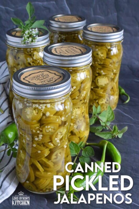 Pair these Canned Pickled Jalapenos with sandwiches, pizza, nachos, burgers, and even scrambled eggs! All you need to prepare these are jalapenos, white vinegar, salt, and water! Easily double or even triple the recipe and stock your canning pantry with these delicious hot and spicy morsels! #pickled #jalapenos
