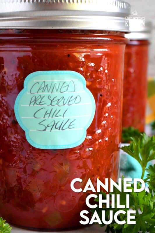 Always have a great tasting chili with deep flavour on hand with this Canned Chili Sauce recipe. Just add beans and simmer! But, that's not all; heat the sauce and ladle it over baked potato, or over fries topped with shredded cheese. So many possibilities when you have pantry stocked with this sauce! #canned #preserved #chili #sauce #tomatoes