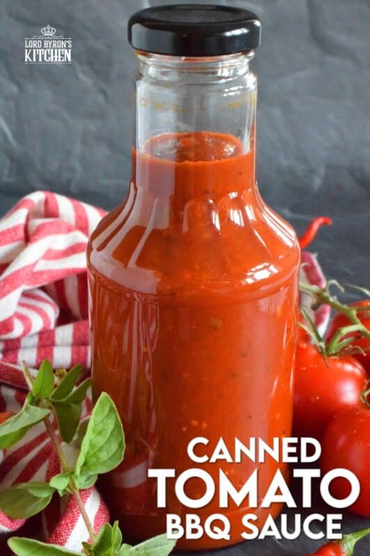 This tomato-based BBQ sauce has so much flavour! It is prepared with tomatoes, onions, bell peppers, garlic, and a hot chili or two if you like it spicy. Process in a water bath canner and stock your pantry with what is about to become your new favourite condiment! #bbq #sauce #canning #tomatoes
