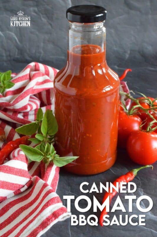 This tomato-based BBQ sauce has so much flavour! It is prepared with tomatoes, onions, bell peppers, garlic, and a hot chili or two if you like it spicy. Process in a water bath canner and stock your pantry with what is about to become your new favourite condiment! #bbq #sauce #canning #tomatoes