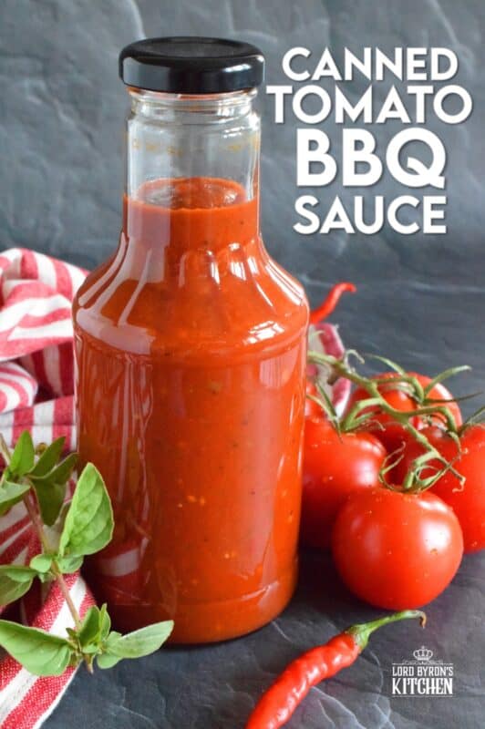 This tomato-based BBQ sauce has so much flavour! It is prepared with tomatoes, onions, bell peppers, garlic, and a hot chili or two if you like it spicy. Process in a water bath canner and stock your pantry with what is about to become your new favourite condiment! #bbq #sauce #canning #tomatoes