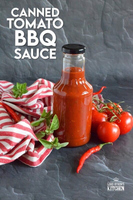 This tomato-based BBQ sauce has so much flavour! It is prepared with tomatoes, onions, bell peppers, garlic, and a hot chili or two if you like it spicy. Process in a water bath canner and stock your pantry with what is about to become your new favourite condiment! #bbq #sauce #canning #tomatoes