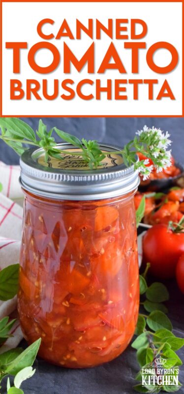 Summer fresh tomatoes are packed into jars and canned with fresh garlic and red onions. Well-seasoned and preserved Canned Tomato Bruschetta can be easily and quickly assembled at any time! Pile onto grilled bread or toss with cooked pasta for a delicious meal! This is a great way to preserve your homegrown tomatoes! #bruschetta #canned #tomatoes #preserved