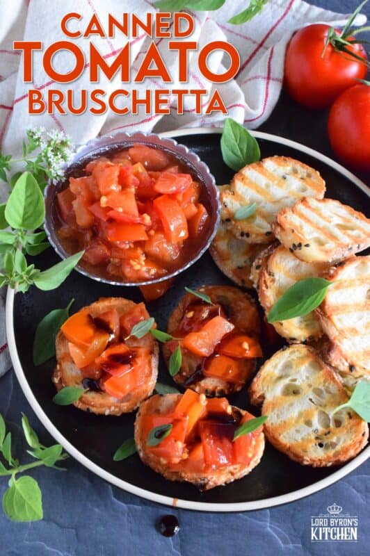 Summer fresh tomatoes are packed into jars and canned with fresh garlic and red onions. Well-seasoned and preserved Canned Tomato Bruschetta can be easily and quickly assembled at any time! Pile onto grilled bread or toss with cooked pasta for a delicious meal! This is a great way to preserve your homegrown tomatoes! #bruschetta #canned #tomatoes #preserved