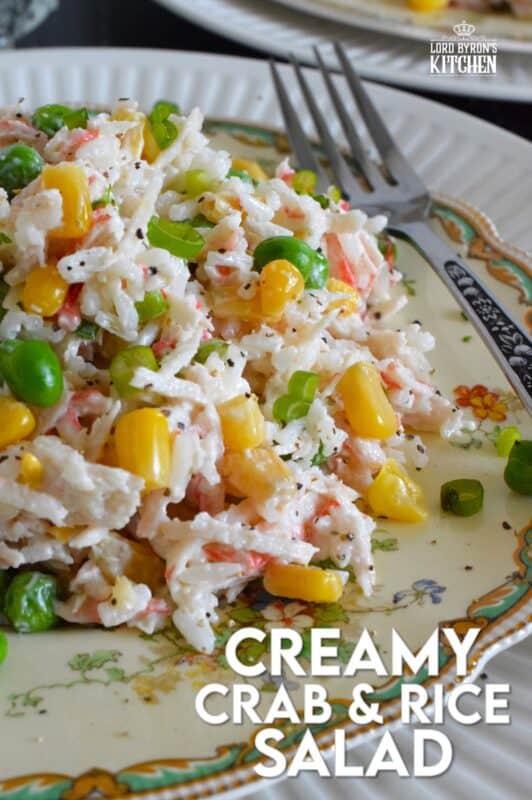 Prepare this recipe using real or imitation crab and leftover cooked rice. Great as a side, but hearty and filling enough to be served as a main, Creamy Crab and Rice Salad tastes light and fresh and is simply delicious! #crab #salad #rice #imitation #seafood