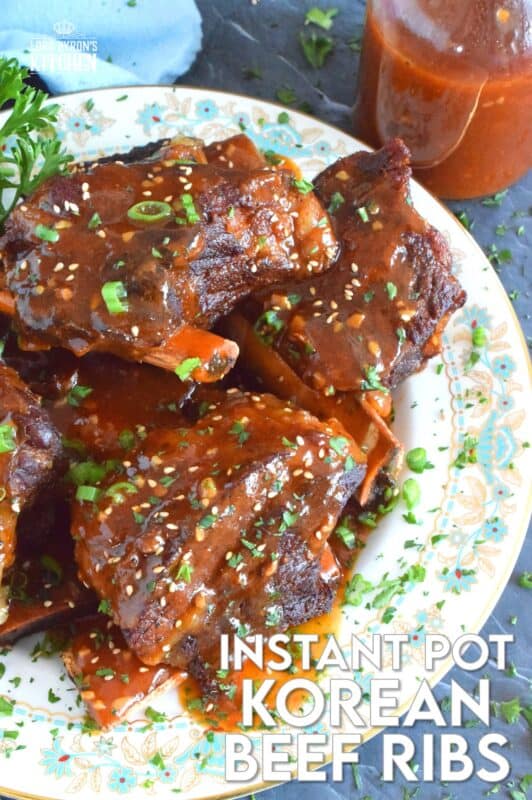 Instant Pot Korean Beef Ribs are fall-off-the-bone tender! This super quick and easy recipe packs a punch of robust and savoury flavours. Prepared with gochujang and honey, these ribs are both a little spicy and sweet. As an added bonus, the cooking liquid doubles as a thick, delicious sauce! #korean #shortribs #beef #ribs #instantpot