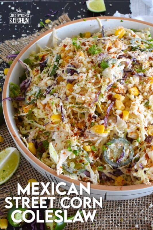 Crisp red and green cabbage, sweet corn, spicy jalapenos, fresh green onions, and salty cotija cheese all meet in the middle to create this most delicious Mexican Street Corn Coleslaw. With its creamy, zingy, and tart dressing, this coleslaw will most definitely please the toughest critic! #mexican #streetcorn #coleslaw #salad