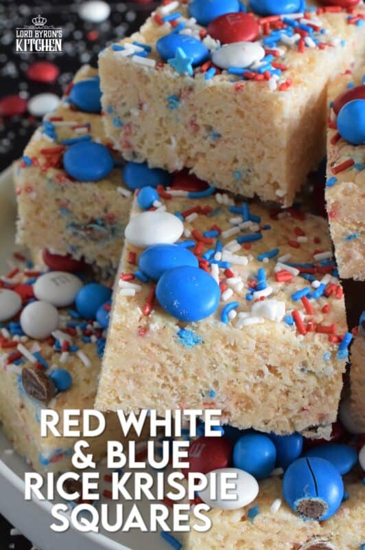 Everyone's favourite treat, these Rice Krispie Squares are loaded with red, white, and blue candy-coated chocolates as well as festive sprinkles. Easy to prepare and fun to eat, these can be prepared with regular or vegan marshmallows if you have any dietary restrictions. #4thofjuly #redwhiteandblue #ricekrispies #treats #squares #dandies