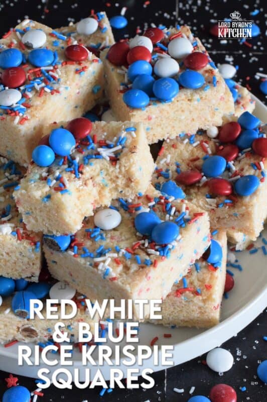 Everyone's favourite treat, these Rice Krispie Squares are loaded with red, white, and blue candy-coated chocolates as well as festive sprinkles. Easy to prepare and fun to eat, these can be prepared with regular or vegan marshmallows if you have any dietary restrictions. #4thofjuly #redwhiteandblue #ricekrispies #treats #squares #dandies