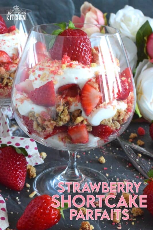 This beautifully presented dessert is exceptionally easy to prepare. Layered with granola, yogurt, and fresh strawberries, is a homemade strawberry shortcake crumb mixture that is the star of this simply refreshing summertime dessert. It's a healthy alternative with just the right amount of indulgence! #strawberries #shortcake #parfait #crumbs