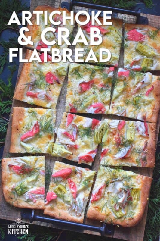 Cheesy, garlicky, and spicy are three words one could use to describe this Artichoke and Crab Flatbread.  Easy to prepare, but authentically delicious, this appetizer will be talked about long after the holidays are over, which is why this recipe makes two! #appetizer #seafood #crab #holiday #christmas #flatbread