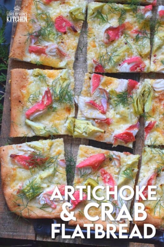 Cheesy, garlicky, and spicy are three words one could use to describe this Artichoke and Crab Flatbread.  Easy to prepare, but authentically delicious, this appetizer will be talked about long after the holidays are over, which is why this recipe makes two! #appetizer #seafood #crab #holiday #christmas #flatbread