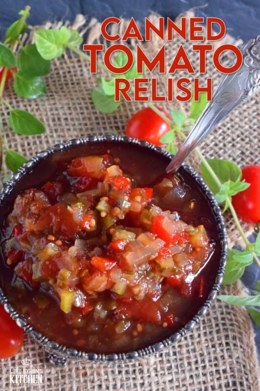 Spoon this Canned Tomato Relish onto hamburgers, hotdogs, sausages, and sandwiches too. Prepared with cucumbers, bell peppers, zucchini, onion, and tomatoes, this relish is the best way to preserve all of that homegrown late-summer harvest! #hamburger #tomato #relish #canning #preserves #tomatoes